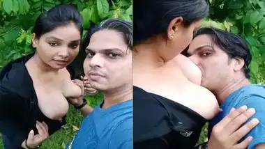 Sucking boobs of gf outdoors on selfie cam