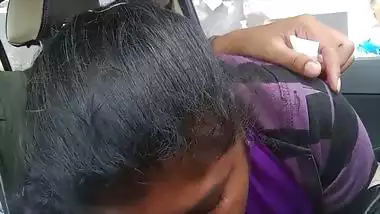 Telugu woman gives a desi blowjob to her man in a car