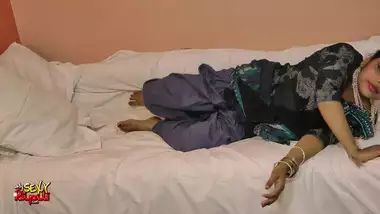 Rupali in bed in blue Indian shalwar suit...