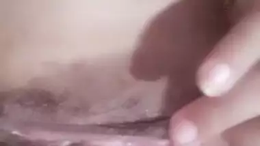 Super sexy girl rubbing her shaved pussy