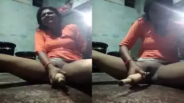 Desi girl dildoing with wooden roti roller